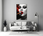 Cuban close-up showing red lips, cigar and ribboned scarlet smoke