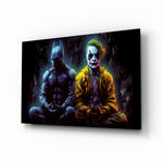 Batman and Joker Making Peace glass wall art displayed above a sectional in a media room