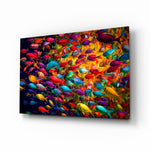 Fish World glass wall art displayed above a sectional in a colorful living room