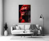 Ape the Thinker close-up showing red wayfarer sunglasses and scarlet rim light