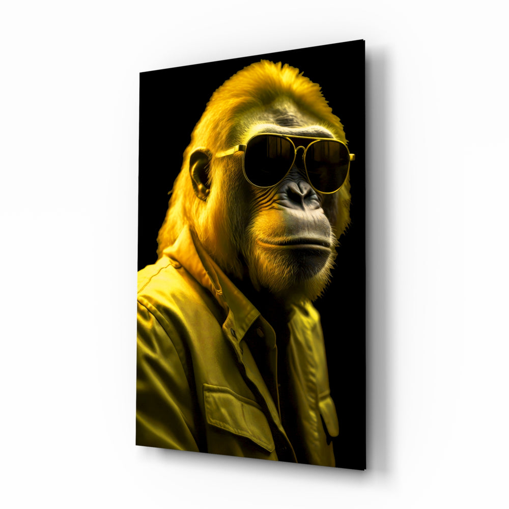 Ape the Cool glass wall art displayed above a leather sofa in a contemporary media room