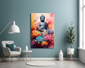 Buddha glass wall art styled above a sectional in a living room with contemplative palette