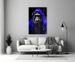 The Ape close-up showing cobalt denim hoodie and electric-blue headphones
