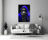 The Ape close-up showing cobalt denim hoodie and electric-blue headphones