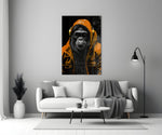 The Ape close-up showing tangerine hoodie and matching headphones