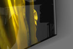 Runway-muse artwork anchoring a wall with canary-and-magenta palette