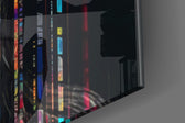 Data-muse artwork anchoring a wall with magenta-and-graphite palette