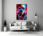 Stylish Woman close-up showing pink sunglasses and orange-magenta drips
