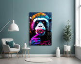 Monkey Kiss glass wall art styled above a desk in a teen bedroom
