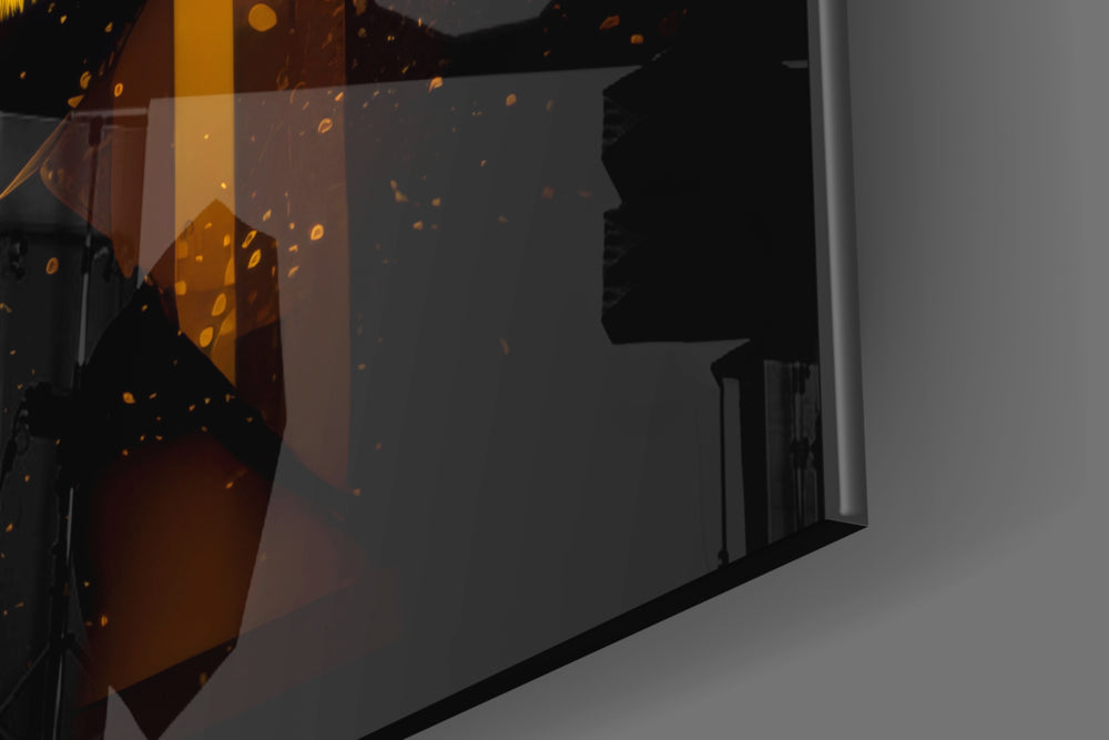 Antihero-muse artwork anchoring a wall with amber-and-onyx palette