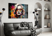 Smarty-Pants glass wall art styled above a console in a creative office