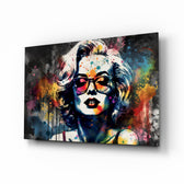 Marilyn Monroe glass wall art displayed above a vanity in a dressing room