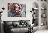 Lollipop glass wall art styled above a desk in a creative office