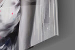 Introspective-muse artwork anchoring a wall with chromatic-burst palette