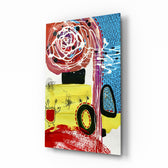 Mix glass wall art displayed above a desk in a creative office