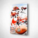 NFL Players glass wall art displayed above a leather sofa in a man cave