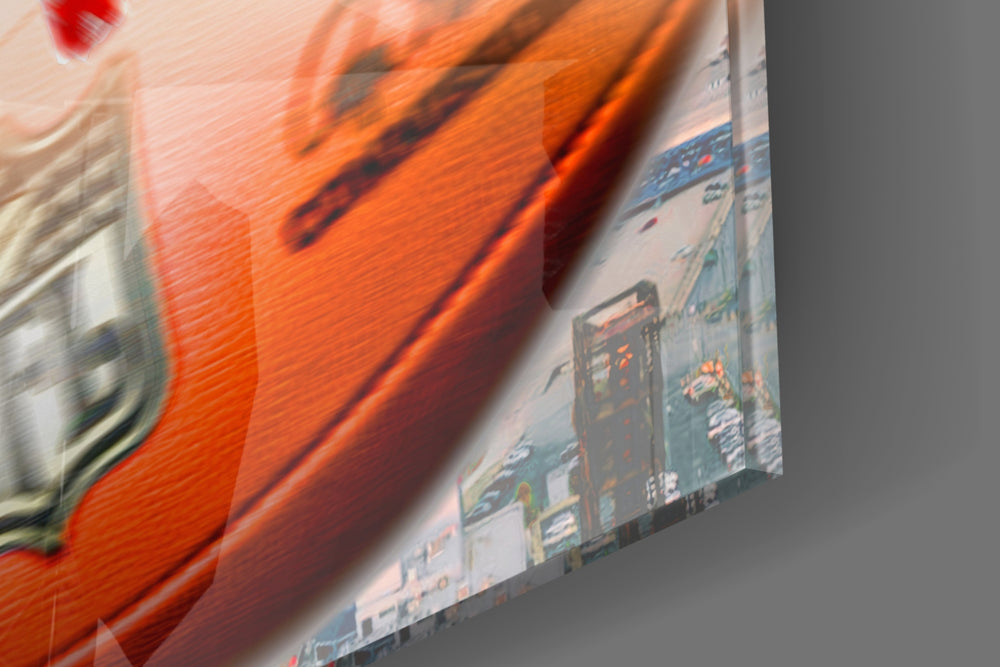 Browns-tribute artwork anchoring a wall with orange-and-ivory palette