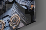 Sci-fi-villain artwork anchoring a wall with gold-and-onyx palette
