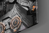 Sci-fi-villain artwork anchoring a wall with copper-and-amber palette