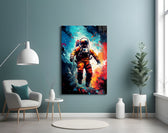 Astronaut glass wall art styled above a sideboard in a creative office