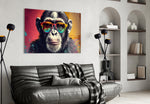 Cool Monkey glass wall art styled above a sideboard in a media room