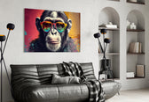 Cool Monkey glass wall art styled above a sideboard in a media room