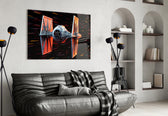 Tie Fighter glass wall art styled above a sideboard in a media room