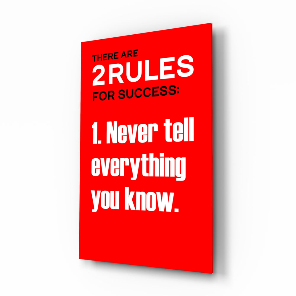 Rules of Success glass wall art displayed above a desk in a home office