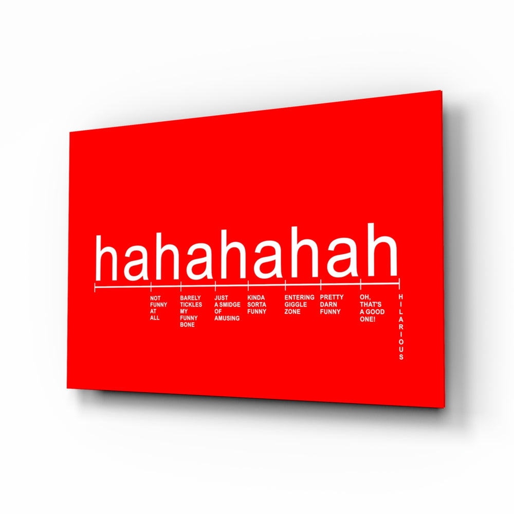 Laughter Analysis glass wall art displayed above a desk in a home office