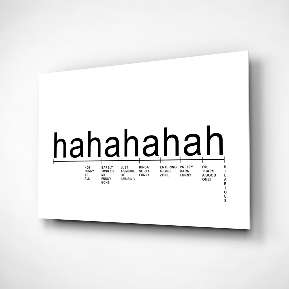 Laughter Analysis glass wall art displayed above a desk in a home office