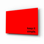 Simple glass wall art displayed above a desk in a home office