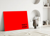 Simple close-up showing lowercase black sans-serif on scarlet
