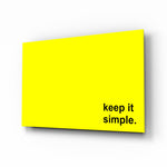 Simple glass wall art displayed above a desk in a home office