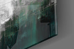 Urban-portrait artwork anchoring a wall with emerald-and-silver palette