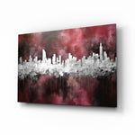 City Silhouette glass wall art displayed above a leather chair in a study
