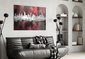 City Silhouette glass wall art styled above a sideboard in a media room