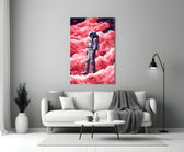 Astronaut on a Pinky Planet close-up showing scarlet cloud landscape