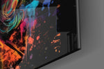 Founding-father artwork anchoring a wall with obsidian-and-spectrum palette