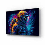 Astronaut glass wall art displayed above a desk in a teen room