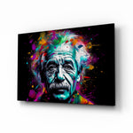 Einstein glass wall art displayed above a leather chair in a study