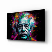 Einstein glass wall art displayed above a leather chair in a study