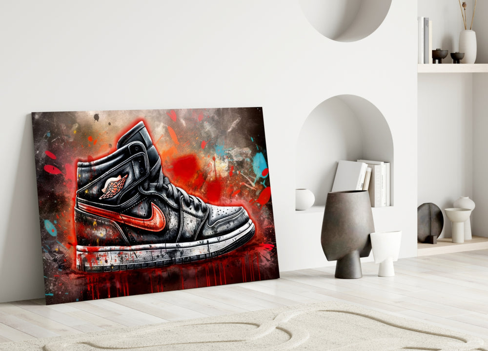 Sneakers close-up showing scarlet Nike swoosh and Wings logo