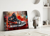 Sneakers close-up showing scarlet Nike swoosh and Wings logo
