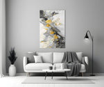Marble close-up showing charcoal veining and gold-leaf accents