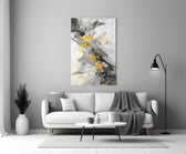 Marble close-up showing charcoal veining and gold-leaf accents
