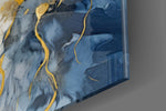 Abstract artwork anchoring a wall with sapphire-and-gold palette