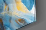 Fluid-art artwork anchoring a wall with cobalt-and-canary palette