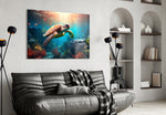 Sea Turtle glass wall art styled above a sideboard in a media room
