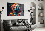 Feelings glass wall art styled above a sideboard in a hotel-style lounge