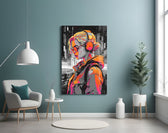 Music Girl glass wall art styled above a sideboard in a creative office